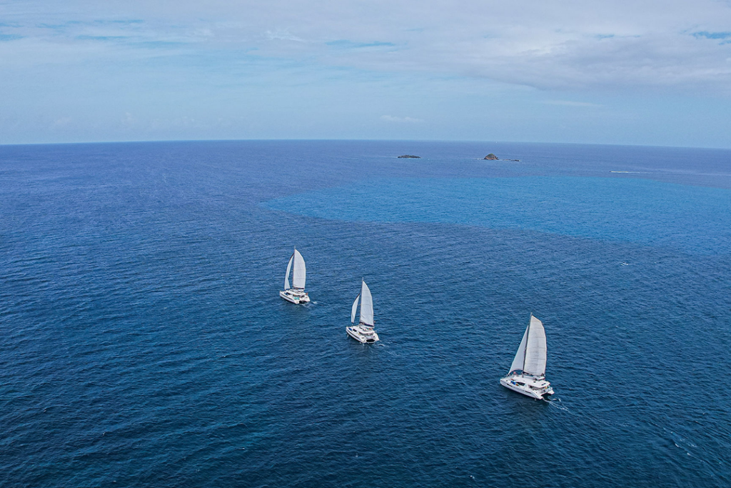 Three sailboats in the Caribbean